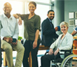 A Group of people smiling at work