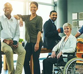 A Group of people smiling at work