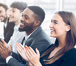 A group at work celebrating an award