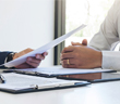 Paperwork being viewed in an office